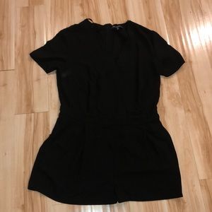 Black short romper with zip up back